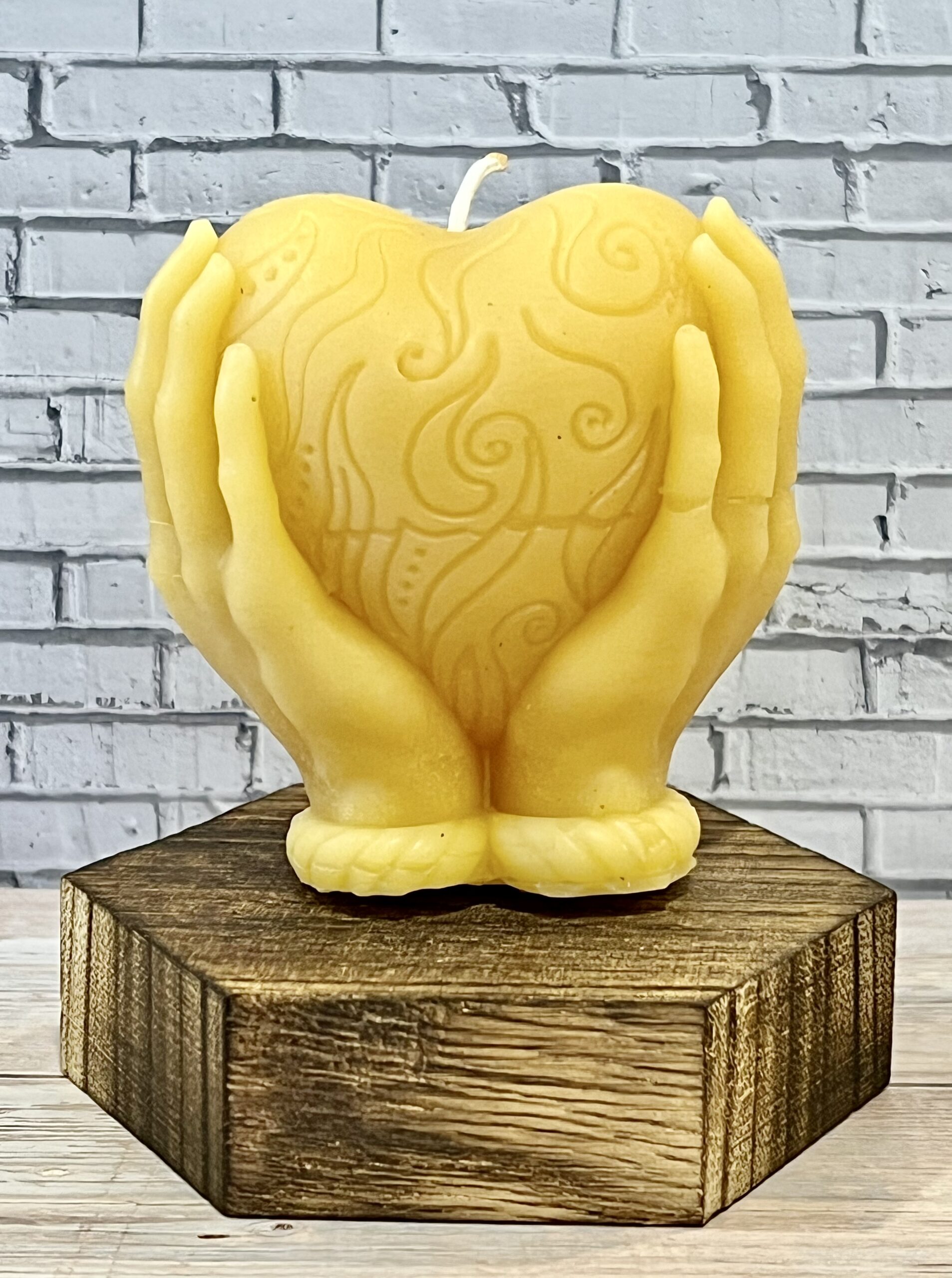 hand holding heart hand holding heart