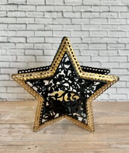 black and gold star tealight holder