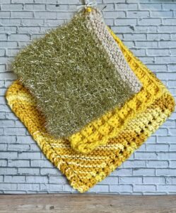 trio of yellow dish cloths