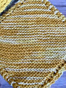 trio of yellow dish cloths